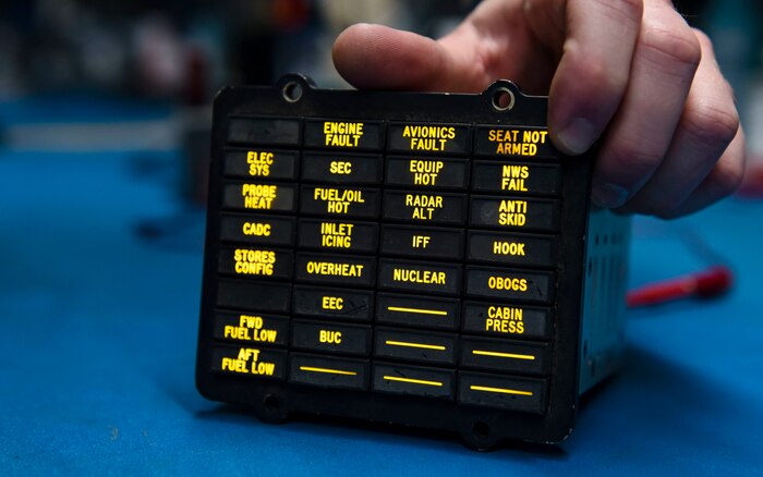 A caution light panel lights up.