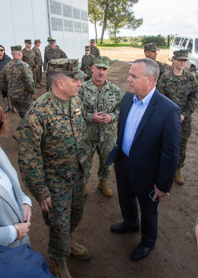 Deputy assistant secretary of defense Judd H. Lyons, and deputy commanding general, I Marine Expeditionary Force (MEF), Brig. Gen. Rick A. Uribe, discuss the ongoing progress of the Marines and Seabees assigned to the Catalina Island “Airport in the Sky” project. The “Airport in the Sky” project falls under the Department of Defense innovative readiness training program.  3rd MAW's partnership with the Catalina Island Conservancy is a unique opportunity for Marines to conduct applicable training while also helping the community. (U.S. Marine Corps photo by Lance Cpl. Juan Anaya)