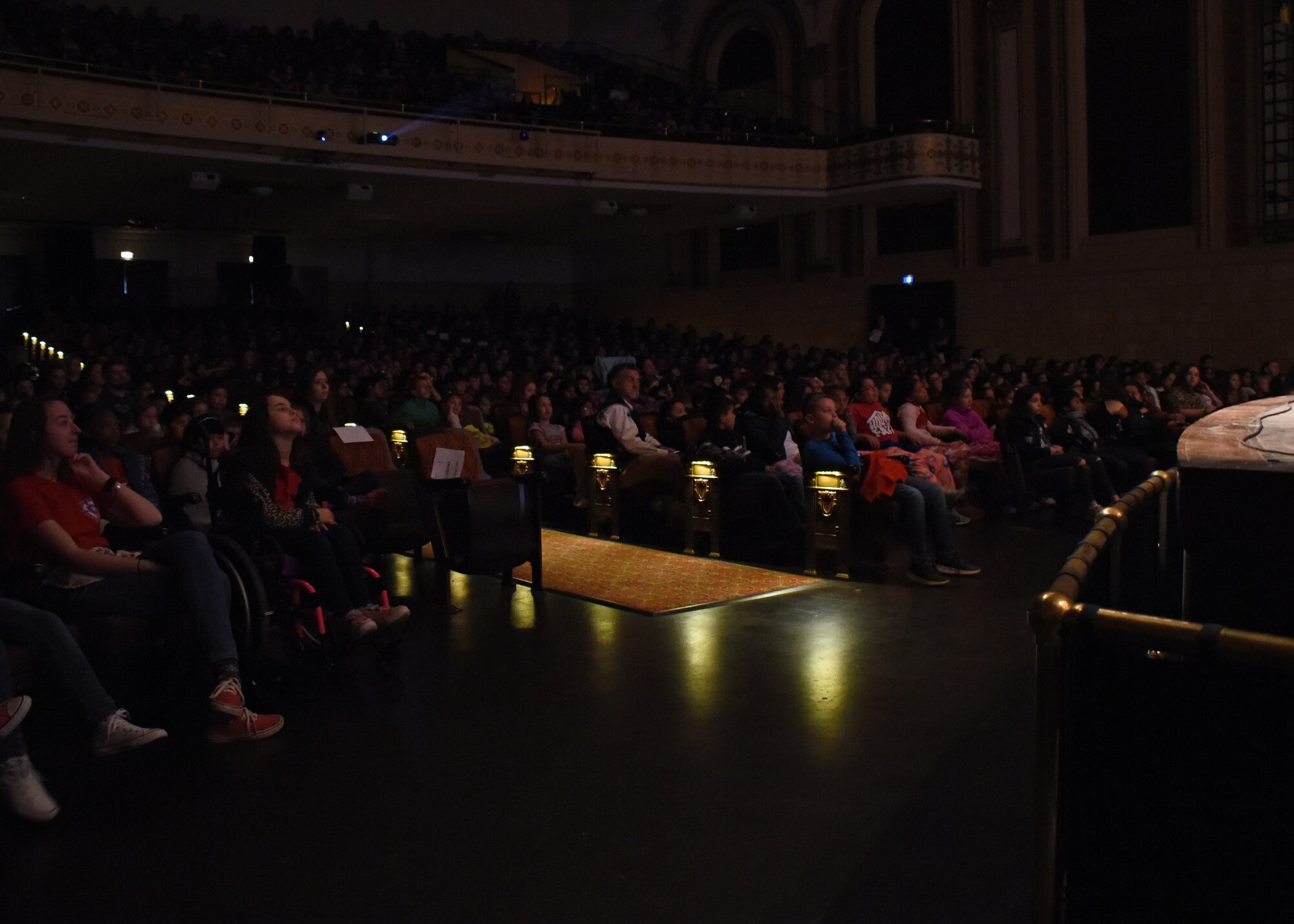 Students watch the San Angelo Symphony performs at the Murphy Performance Hall, San Angelo, Texas, March 1, 2019. The students were invited out to a free performance to the theme of Flight and Fantasy which included songs from the movies "Hook", "ET" and "Star Wars". (U.S. Air Force photo by Airman 1st Class Zachary Chapman/Released)