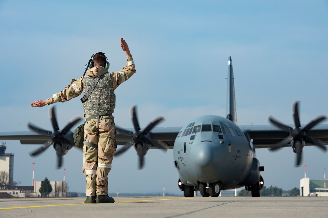 An Air Force crew chief launches an aircraft.