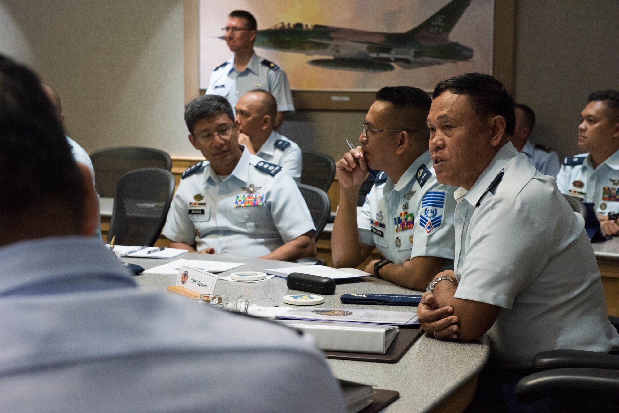 Philippine air force (PAF) Maj. Gen. Nicolas C. Parilla (right), PAF acting vice commander, discusses upcoming events during this year’s PAF-Pacific Air Forces Airman-to-Airman (A2A) talks, at Joint Base Pearl Harbor-Hickam, Hawaii, Feb. 26, 2019.
