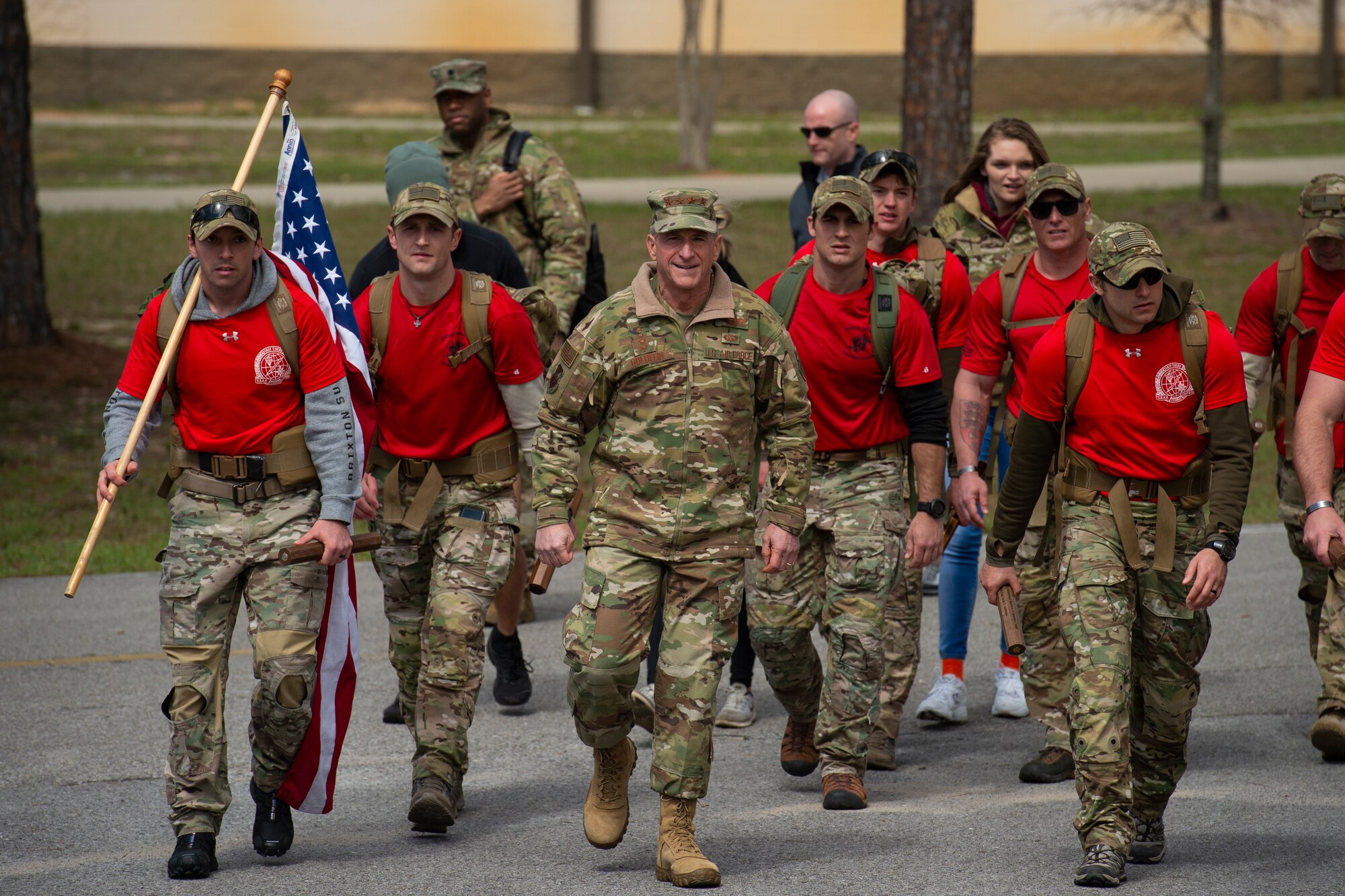 Air Force Chief of Staff Gen. David L. Goldfein marches alongside Special Tactics Airmen with the 24th Special Operations Wing during the Special Tactics Memorial March at Hurlburt Field, Florida, March 4, 2018.