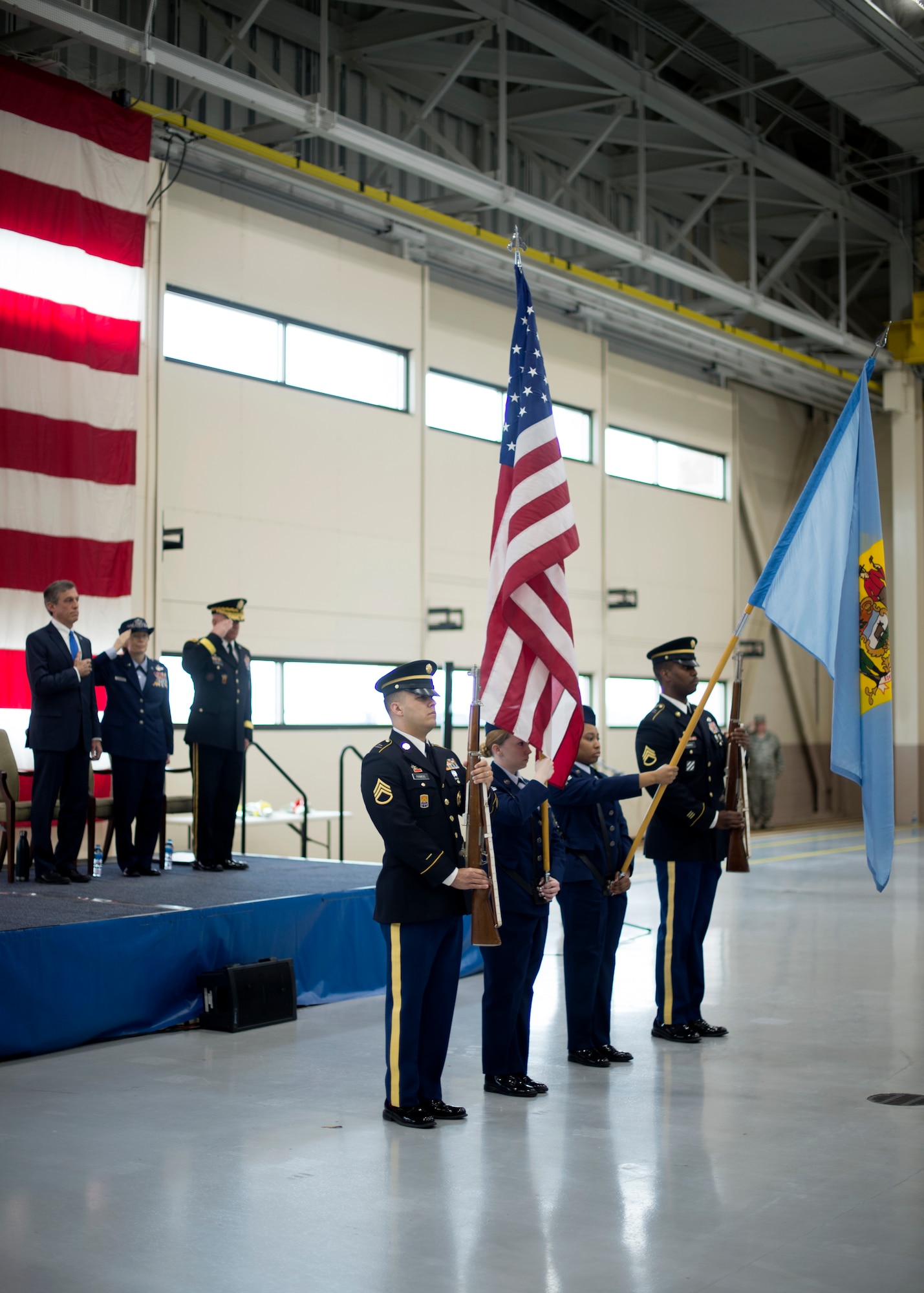 The Delaware National Guard present the colors during a change of command ceremony at the Army Aviation Facility, New Castle, Del., March 2, 2019. Prior to his new position as The Adjutant General, U.S. Army Brig. Gen. Michael Berry served as the Director of the DNG Joint Staff. (U.S. Air National Guard photo by Senior Airman Katherine Miller)