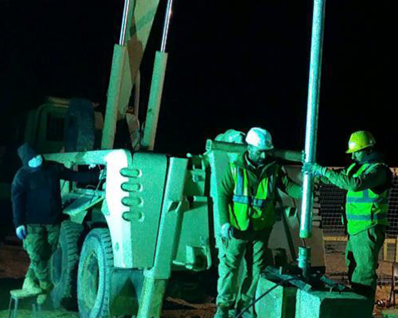 At about 1:30 a.m. the pump is staged to be placed back in its original position.