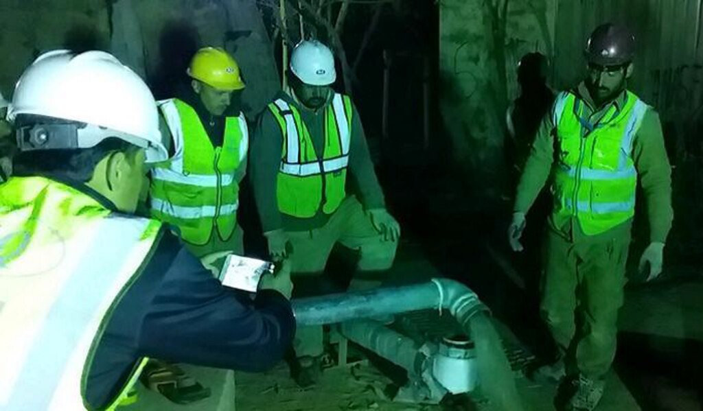 Final tests of the completed system repairs take place after 2 a.m., before the team wraps up about a 7-hour emergency repair process.