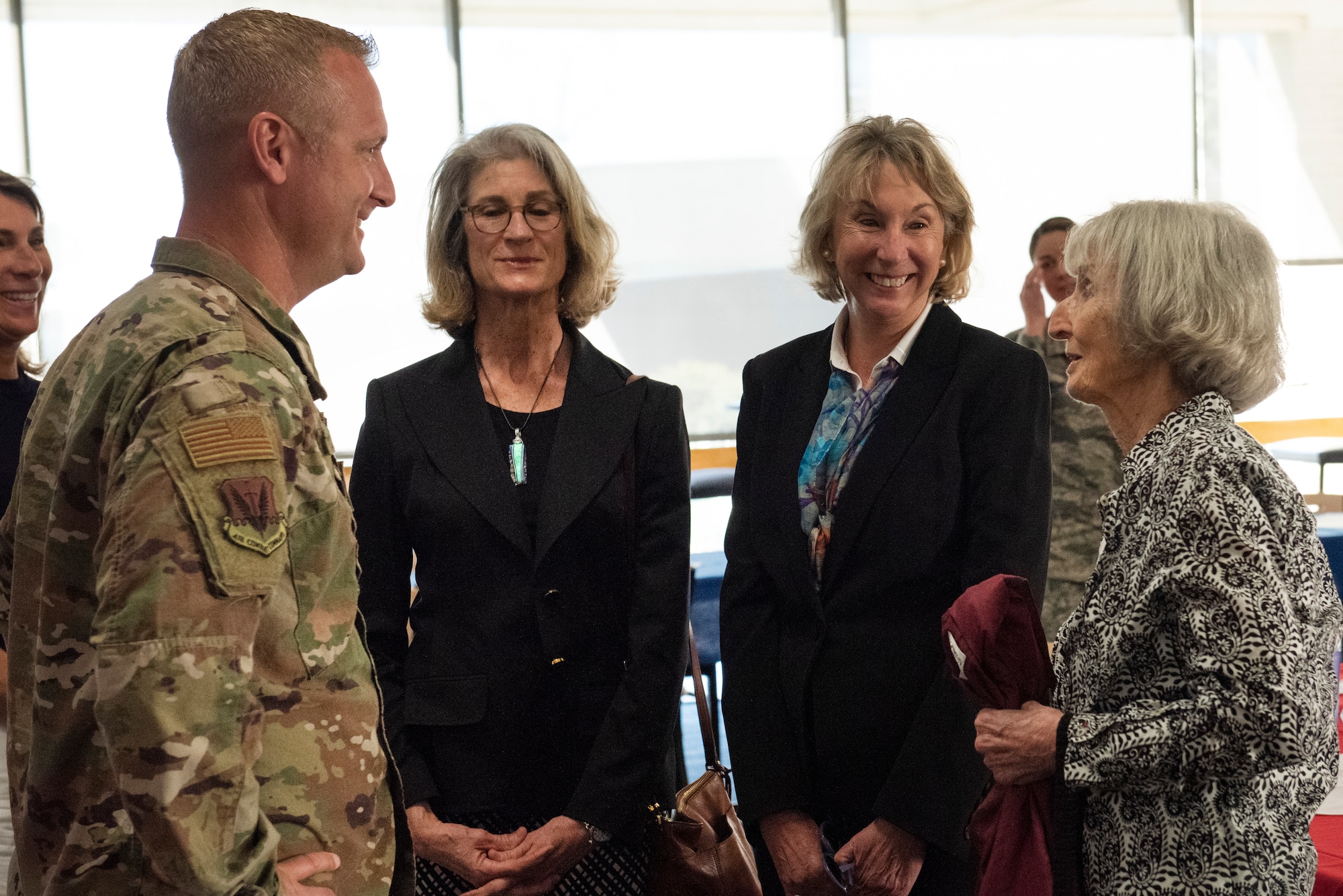 Col. Brian Laidlaw, 325th Fighter Wing commander, thanks Mary Tyndall Troff, daughter of World War I pilot Lt. Frank B. Tyndall, 2nd Bombardment Group, for visiting the base and meeting with the Airmen stationed here at Tyndall Air Force Base, Fla., Feb. 25, 2019. Mary and her daughters were invited to visit TAFB after she sent a letter about her concerns for the base and the well-being of Airmen after Hurricane Michael. (U.S. Air Force photo by Staff Sgt. Alexandre Montes)