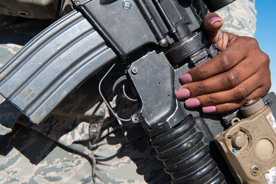 U.S. Air Force Airman 1st Class Cassandra Edwards, 377th Weapons System Security Squadon response force leader, performs her daily duties at Kirtland Air Force Base, March 28. Airman Edwards has been a defender for two years and hopes to be a K9 handler. (U.S. Air Force photo by Staff Sgt. J.D. Strong II)