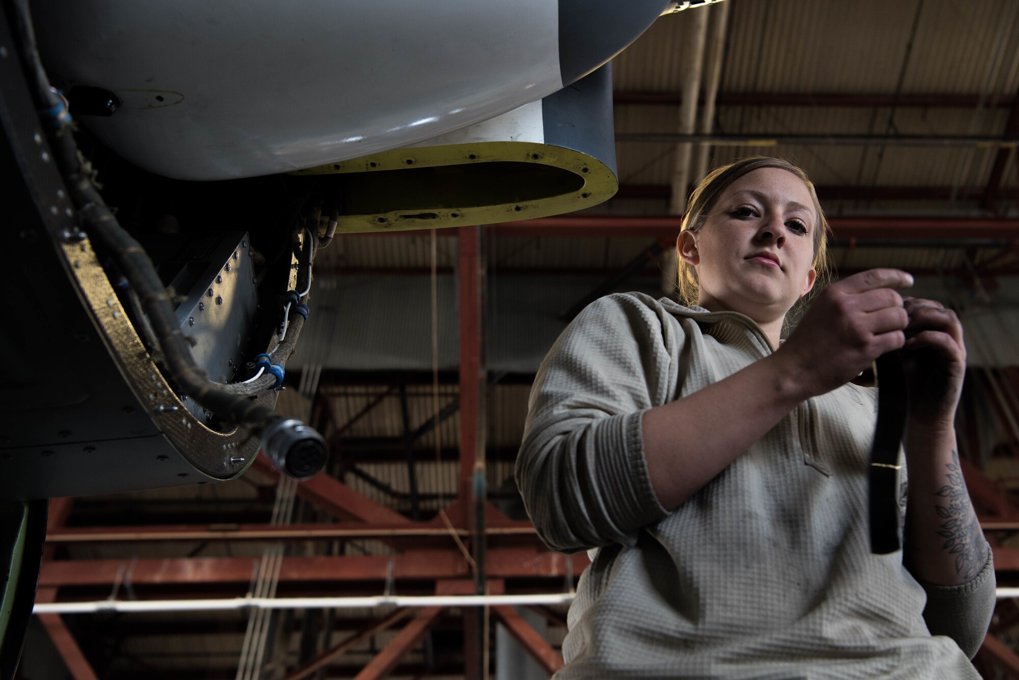U.S. Air Force Senior Airman Lauren Pape, 71st Aircraft Maintenance Unit CV-22 electrician, performs her daily duties at Kirtland Air Force Base, N.M., March 8. Airman Pape is one of two female Airmen assigned to the 71st Aircraft Maintenance Unit (U.S. Air Force photo by Staff Sgt. J.D. Strong II)