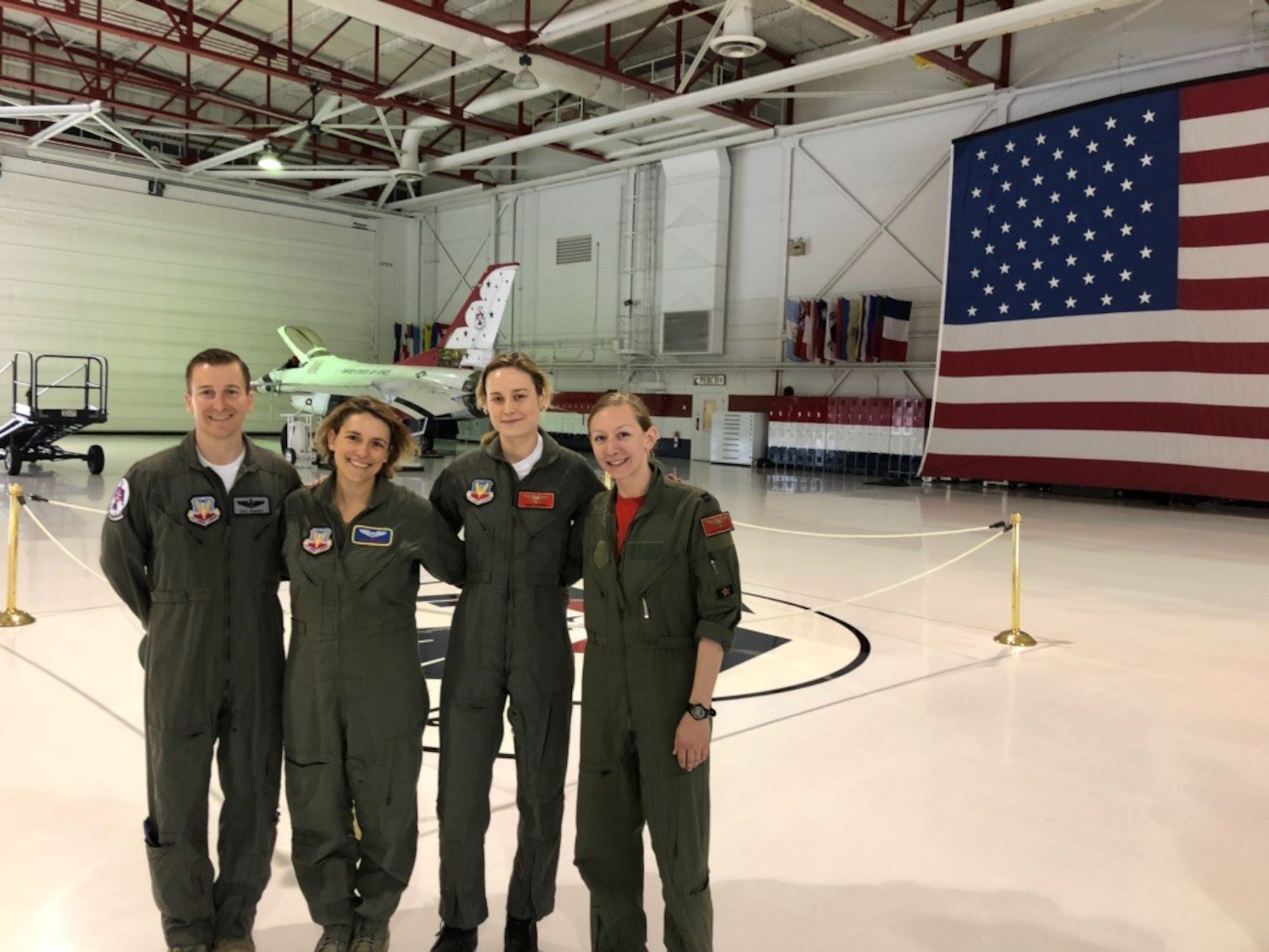 Capt. Danielle Park (right), 311th Fighter Squadron instructor pilot, stands next to Brie Larson, who stars in the Captain Marval film, in a hangar at Nellis Air Force Base, Nev. in 2018. Park was invited to attend the premiere of Captain Marval in Los Angeles, Calif., March 3-4, 2019, after giving the actress, Brie Larson, a ride in an F-16 Fighting Falcon while stationed at Nellis. (Courtesy photo)
