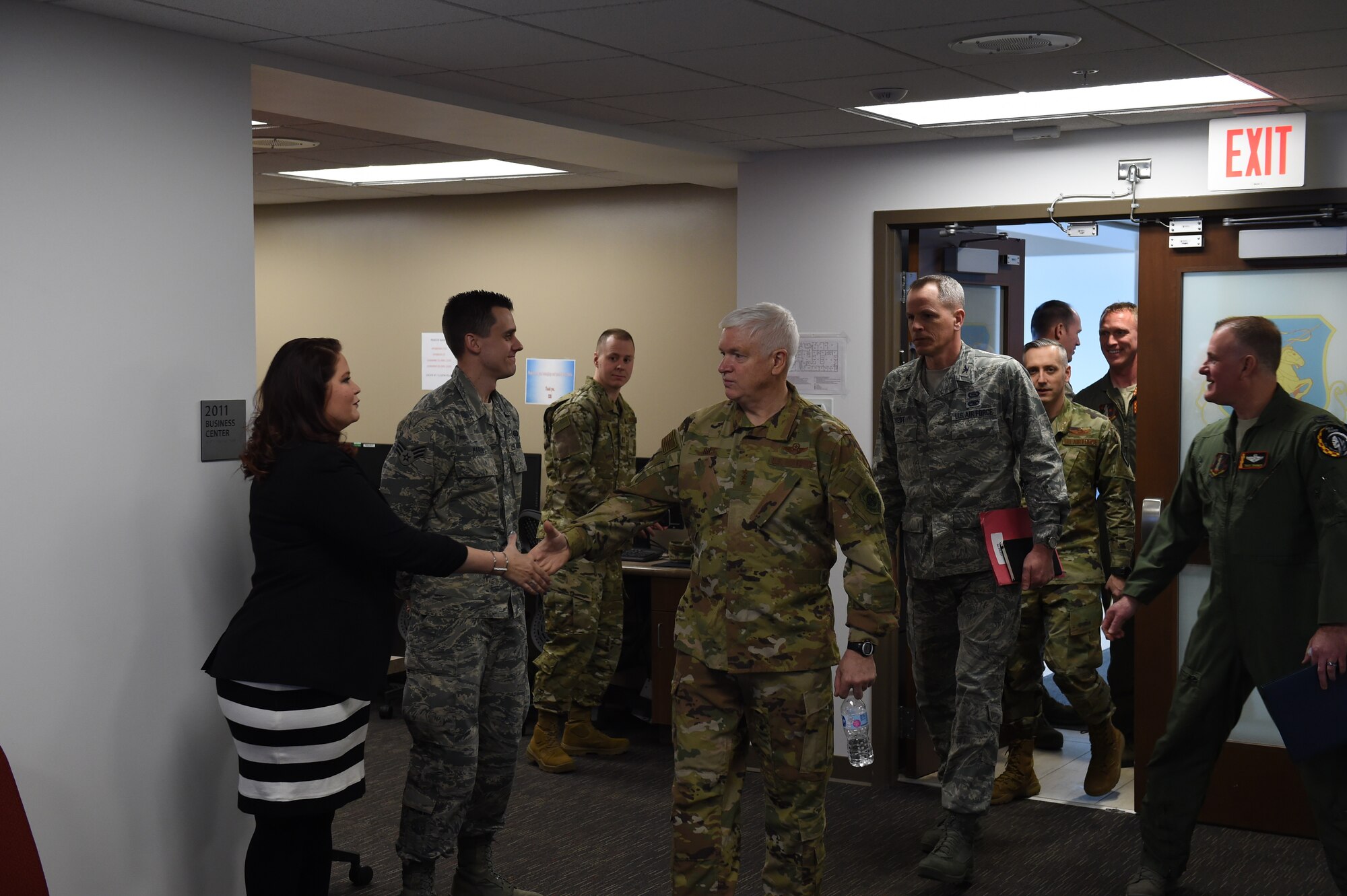 Britny Marin (left) and her husband Senior Airman Shane Marin (middle) are greeted by Lt. Gen. Scott Rice, Director of the Air National Guard, February 13, 2019. Britny won 2018 Joan Orr Air Force Spouse of the Year Award at the Air National Guard level. (U.S. Air National Guard photo by Senior Master Sgt. Robert Shepherd)