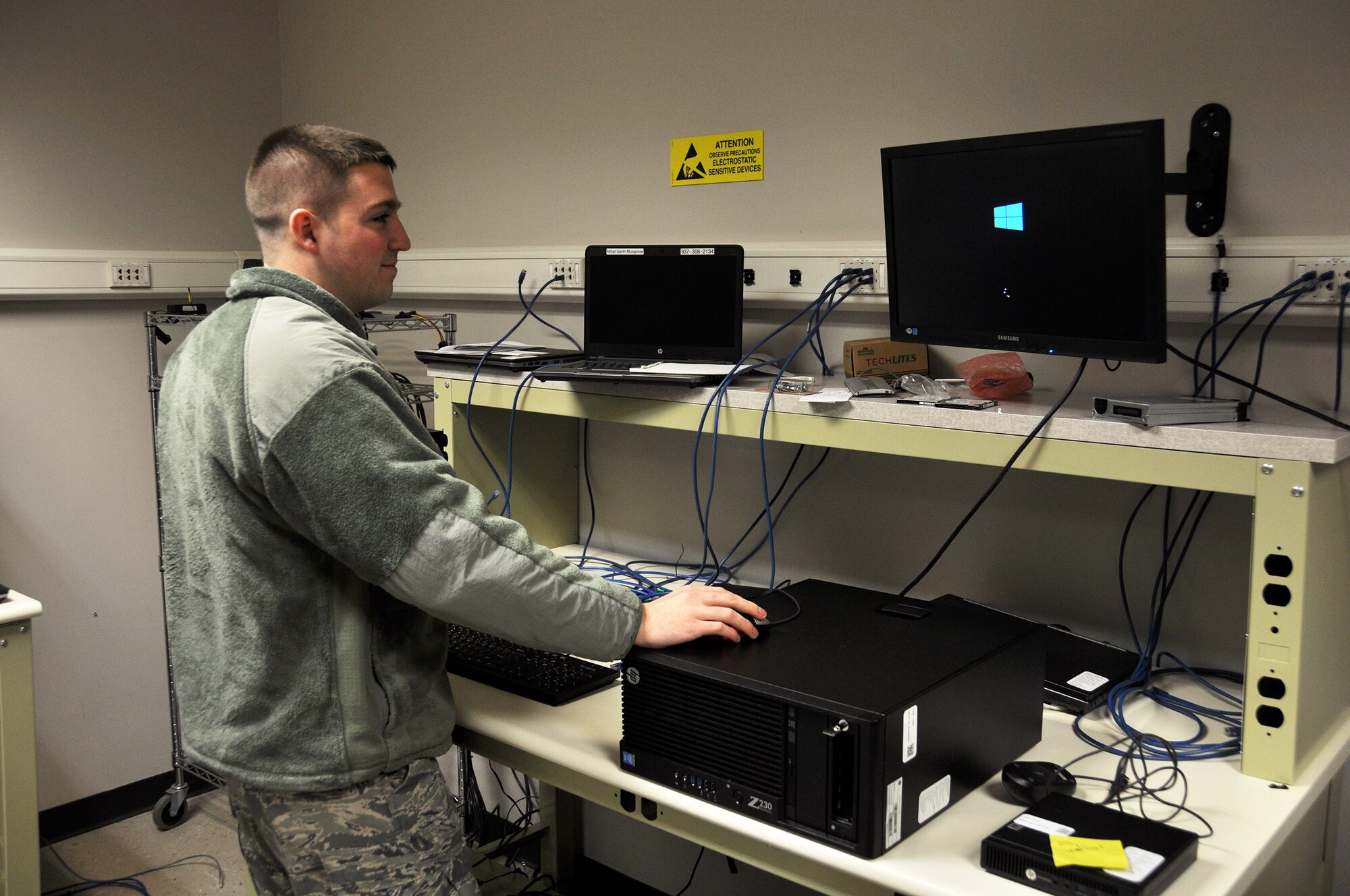 Staff Sgt. Matthew Roberts, a client systems technician with the 445th Force Support Squadron communications element, reboots a computer to make sure there are no issues before giving back to a client. Airmen that work in the 445th Force Support Squadron communications element maintain equipment, troubleshoot systems and ensure wing members have access to the technology they rely on to excel.