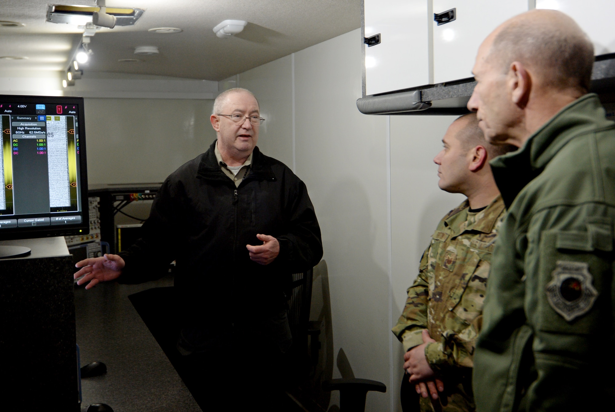 Patrick Moran, 346th Test Squadron TEMPEST technician, provides U.S. Air Force Gen. Mike Holmes, commander of Air Combat Command, a tour of the squadron’s emissions security van during Holmes’ visit to Joint Base San Antonio-Lackland, Texas, March 4, 2019. The squadron conducts operational tests, evaluations and special assessments of cyberspace capabilities, and provides cyberspace test and training ranges to enhance the military utility of cyberspace. (U.S. Air Force Photo by Tech. Sgt. R.J. Biermann)