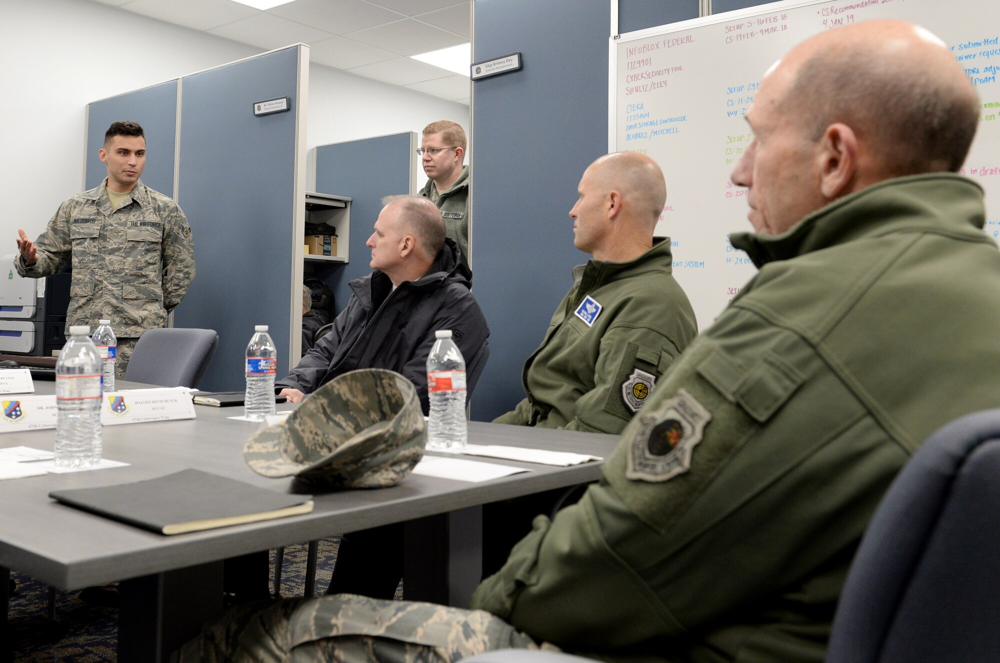 U.S. Air Force Airman 1st Class Daniel Maldonado, 346th Test Squadron test engineer, briefs U.S. Air Force Gen. Mike Holmes, commander of Air Combat Command, on the Unified Capabilities Assessment Program, during Holmes’ visit to Joint Base San Antonio-Lackland, Texas, March 4, 2019. The UCAP team provides Department of Defense Information Network Approved Products List testing before the equipment can be connected to the DODIN. (U.S. Air Force Photo by Tech. Sgt. R.J. Biermann)