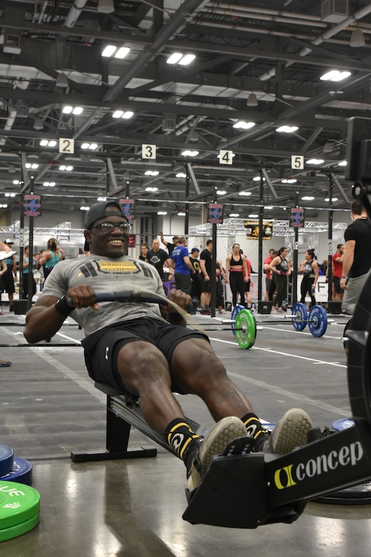 Smith performing a 30 calorie row on the row machine.