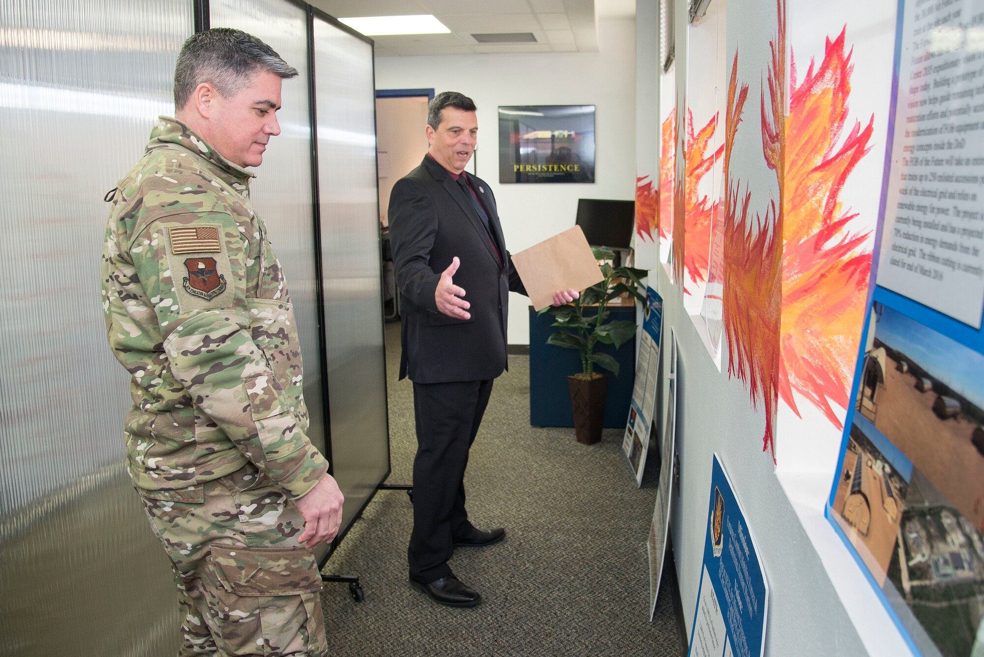 Sean Harrington, Air Education and Training Command Innovation Advancement Division lead, highlights the capabilities of the "Fire Pit" to Col. Jason Lamb, AETC's Director of Intelligence, Analysis, and Innovation, March 5, 2019, at Joint Base San Antonio-Randolph, Texas.  Mirrored to the wing level Spark Cell variant, the "Fire Pit" is AETC’s effort to invigorate innovation and support grassroots initiatives in a collaborative space designed to incubate and accelerate innovation initiatives and build a network with industry, academia, and the Department of Defense to provide rapid solutions to the needs of the warfighter.  (U.S. Air Force photo by Sean Worrell)