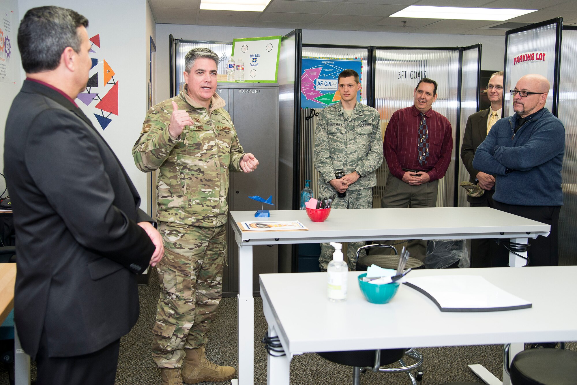 Col. Jason Lamb (2nd from left), Air Education and Training Command Director of Intelligence, Analysis, and Innovation, speaks to attendees at the grand opening of the command's "Fire Pit" workshop March 5, 2019, at Joint Base San Antonio-Randolph, Texas.  Mirrored to the wing level Spark Cell variant, the AETC Fire Pit is the major command’s effort to invigorate innovation and support grassroots initiatives in a collaborative space designed to incubate and accelerate innovation initiatives and build a network with industry, academia, and the Department of Defense to provide rapid solutions to the needs of the warfighter.  (U.S. Air Force photo by Sean Worrell)