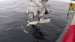 The AN/AQS-20C towed mine-hunting sonar is streamed into Gulf of Mexico waters of the Naval Surface Warfare Center Panama City Division, Florida. Gulf test range. Developmental Testing was completed on Feb. 12, 2019. The testing marks completion of incorporating the Charlie variant sonar sensor modernization.