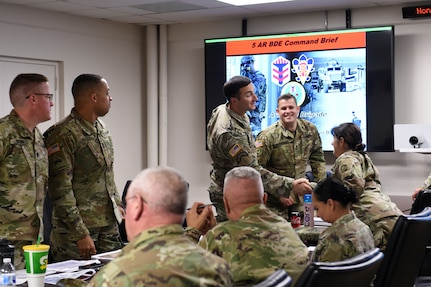 Brig. Gen. Kris A. Belanger, right, Commanding General, 85th U.S. Army Reserve Support Command, meets assigned Army Reserve battalion commanders and staff, operationally controlled by First Army’s 5th Armored Brigade, during a command site visit, there, at Fort Bliss, Texas, March 1-3, 2019.