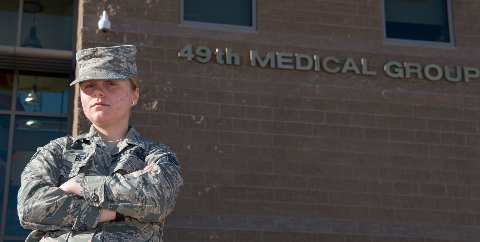 Senior Airman Hali Bean, 49th Medical Group Family Health front desk clerk, poses for a portrait, Feb. 7, 2019, on Holloman Air Force Base, N.M. Bean has been working on Holloman for almost three years and had her first encounter with a code blue this January. (U.S. Air Force photo by Airman 1st Class Quion Lowe)