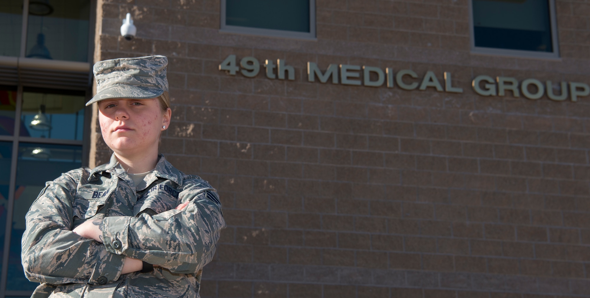 Senior Airman Hali Bean, 49th Medical Group Family Health front desk clerk, poses for a portrait, Feb. 7, 2019, on Holloman Air Force Base, N.M. Bean has been working on Holloman for almost three years and had her first encounter with a code blue this January. (U.S. Air Force photo by Airman 1st Class Quion Lowe)