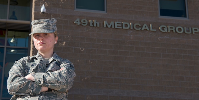 Senior Airman Hali Bean, 49th Medical Group Family Health front desk clerk, poses for a portrait, Feb. 7, 2019, on Holloman Air Force Base, N.M. Bean has been working on Holloman for almost three years and had her first encounter with a code blue this January. (U.S. Air Force photo by Airman 1st Class Quion Lowe)