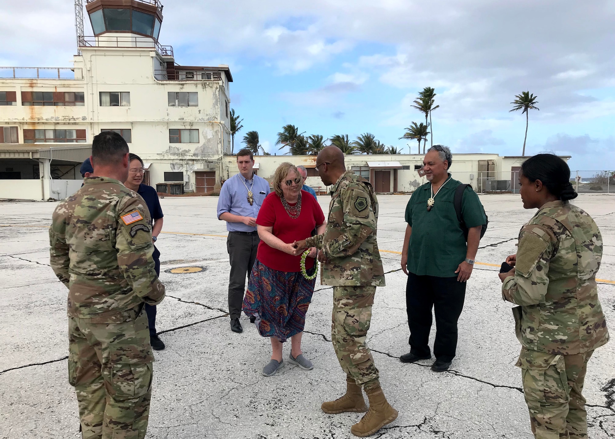 Gen. CQ Brown, Jr., Pacific Air Forces commander, greets Ambassador Karen Stewart, U.S. Ambassador to the Republic of the Marshall Islands, at Bucholz Army Airfield, Kwajalein Atoll, Republic of the Marshall Islands, Feb. 20, 2019.