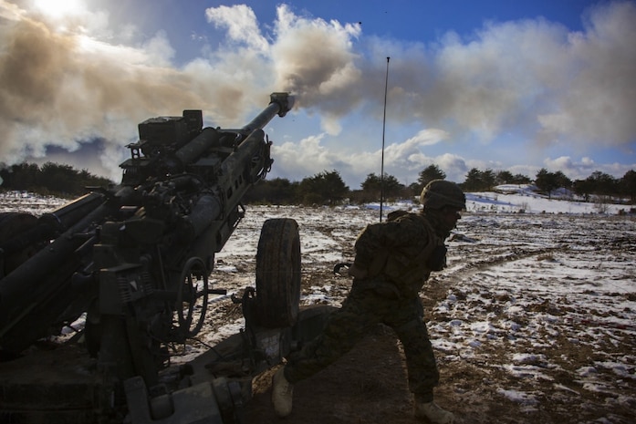 U.S. Marine Corps Lance Cpl. Johnathan Delgado, a field artillery Marine with 3rd Battalion, 12th Marine Regiment, 3rd Marine Division, fires a M777 Howitzer in the Ojojihara Maneuver Area, Miyagi Prefecture, Japan, Feb. 10, 2019. Marines with 3/12 are training in the Ojojihara Maneuver Area as part of the Artillery Relocation Training Program 18-4. ARTP is a routine training exercise that allows Okinawa-based Marines to conduct live-fire training in Japan. (U.S. Marine Corps photo by Lance Cpl. Christian Ayers)