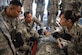 U.S. Air Force Master Sgt. Tatiana Abasolo, a member of the Air Force Reserve’s 624th Aeromedical Staging Squadron, provides instruction on how to properly secure a patient for movement during an aeromedical staging and aerial port training at Joint Base Pearl Harbor-Hickam, Hawaii, March 3, 2019.