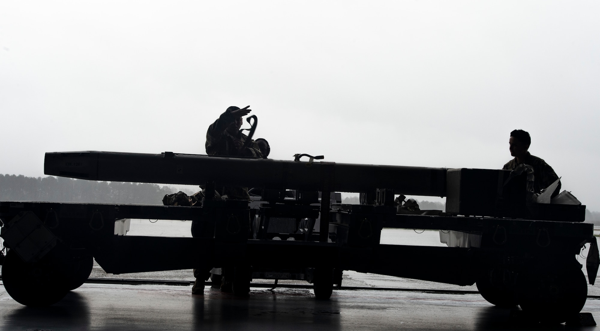 U.S. Airmen assigned to the 20th Aircraft Maintenance Squadron, 77th Aircraft Maintenance Unit (AMU), prepare munitions during a Load Crew of the Year competition at Shaw Air Force Base, S.C., March 1, 2019.