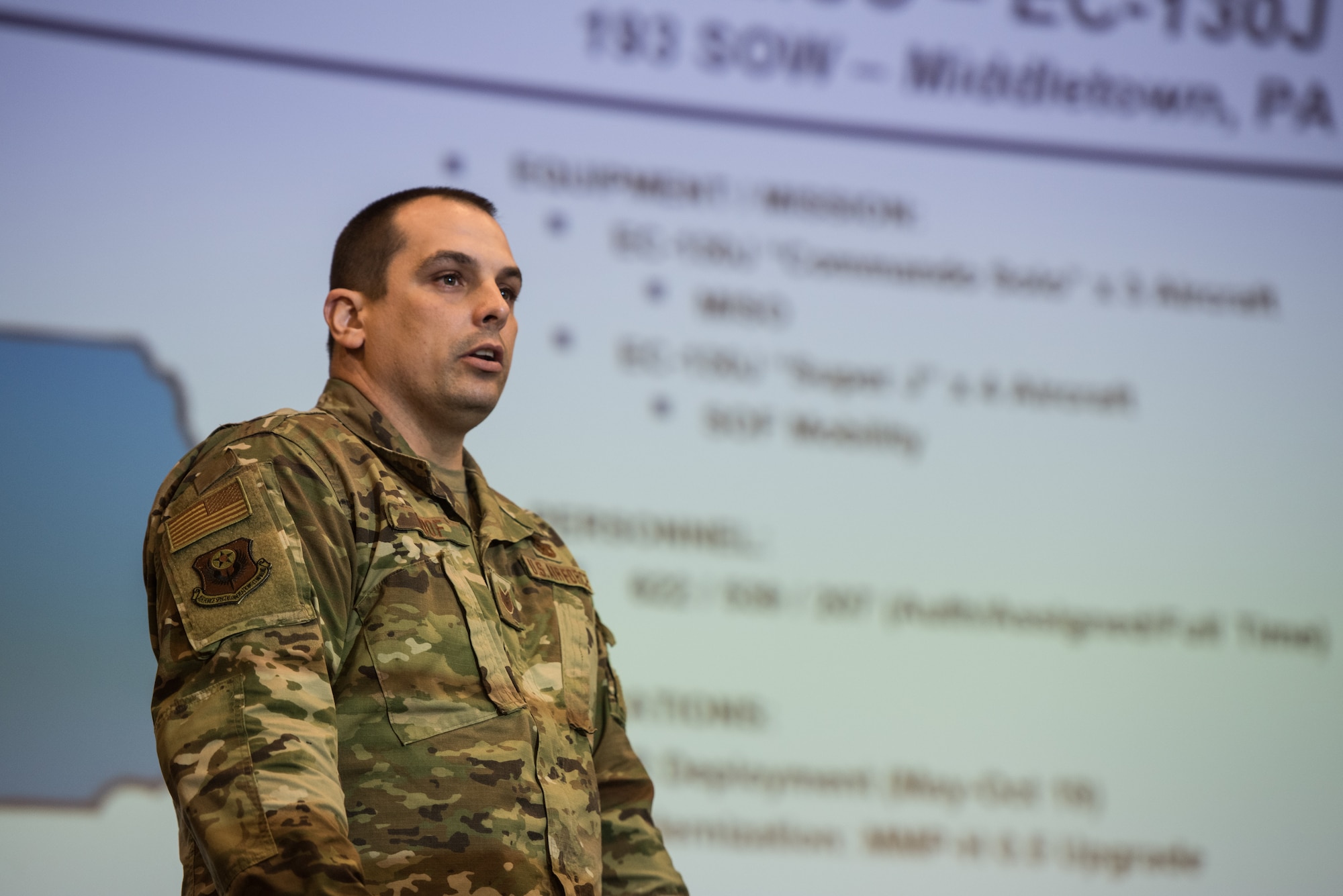 Tech. Sgt. Jody Roof briefs the 193rd SOW mission during a joint recruiting event, Feb. 27, 2019, in Hurlburt Field, Florida.