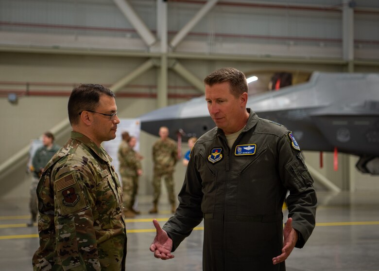 Maj. Gen. Patrick Doherty, 19th Air Force commander, talks with Col. Gregory Hutson, 56th Maintenance Group commander, March 4, 2019 at Luke Air Force Base, Ariz.