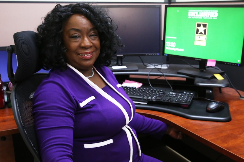 Charlene Wilson, lead contract specialist for the 408th Regional Contracting Center-Qatar’s quality management team at Camp As Sayliyah, Qatar poses for a photo Mar. 6, 2019. Wilso was recently named a "Hero of the Week" for her work in US Army Central because of her work in the RCC.