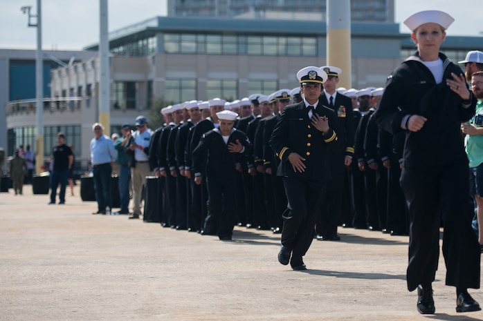 Crew members of the USS Charleston (LCS-18) officially man the ship for the first time at its commissioning ceremony March 2, 2019, in Charleston, S.C. The USS Charleston—a Littoral Combat Ship intended for more shallow waters than typical Navy vessels—is the sixth naval ship named after the city. Although the ship will be stationed in San Diego, CA, the captain and members of the crew will make annual trips to Charleston to interact with the city and work with the Navy League of Charleston to maintain the relationship between the namesake city and the ship.