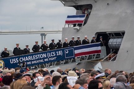 Crew members of the USS Charleston (LCS-18) officially man the ship for the first time at its commissioning ceremony March 2, 2019, in Charleston, S.C.