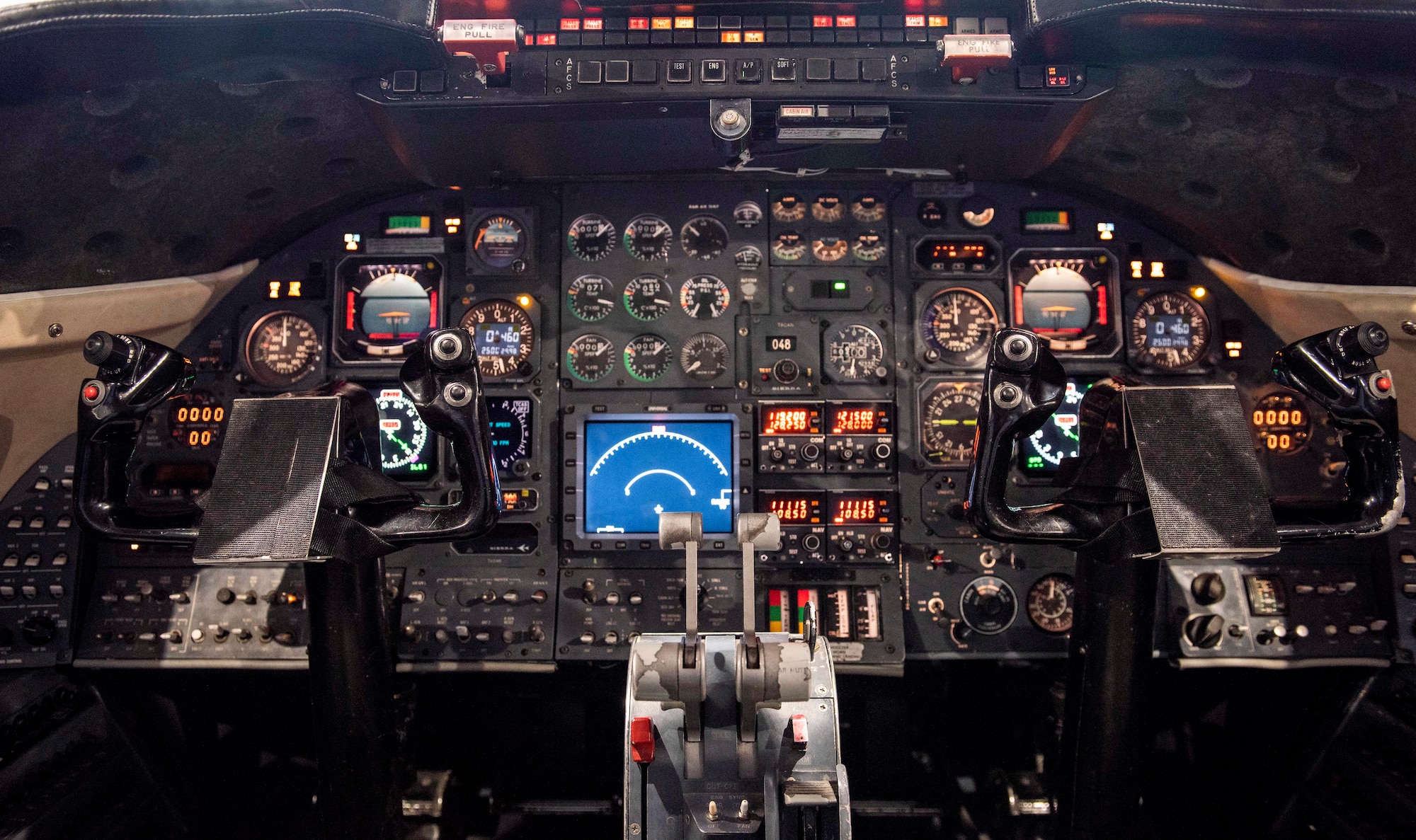 A view of the legacy cockpit of the C-21 aircraft, which is undergoing a $38 million avionics upgrade. (U.S. Air Force photo by Senior Airman Daniel Garcia)