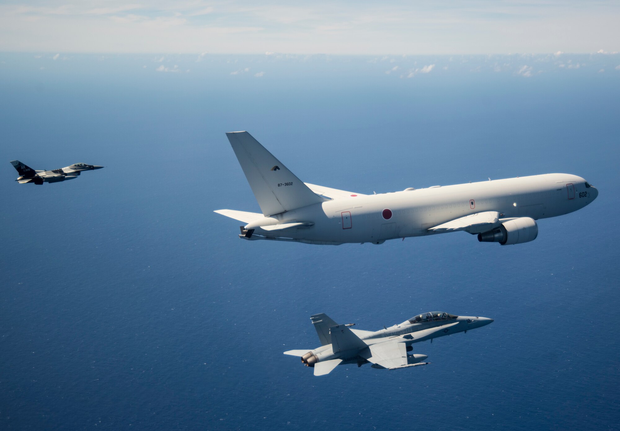 Aircraft from the United States and Japan participate in a COPE North 2019 airpower demonstration formation over the Pacific Ocean, March 6, 2019.