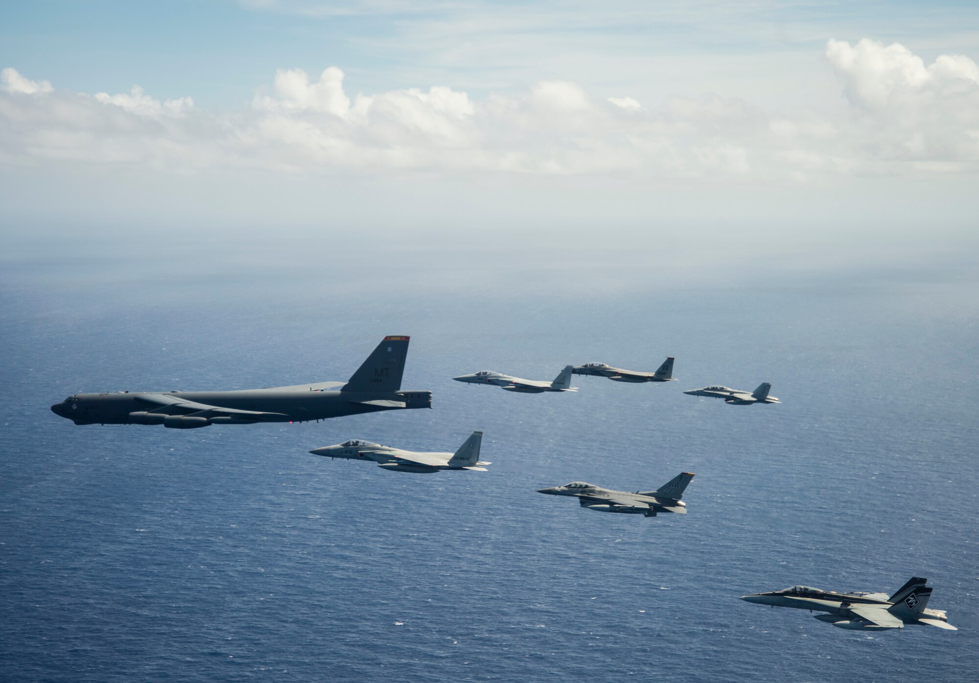 Aircraft from the United States, Australia and Japan participate in a COPE North 2019 airpower demonstration formation over the Pacific Ocean, March 6, 2019.