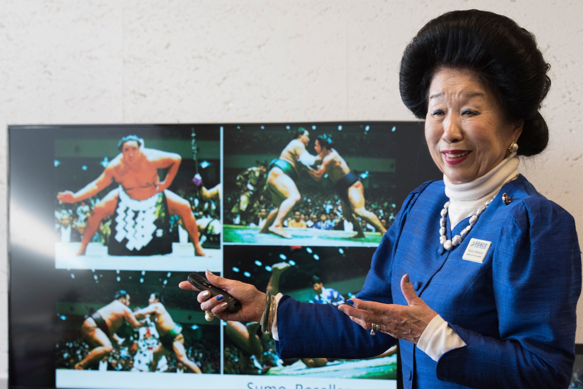 Yasuko Birkhead, 374th Force Support Squadron Japanese cultural adaptation instructor, gives a brief on Japanese traditional sports, Sumo, to attendees during Japanese customs and courtesies class at Yokota Air Base, Japan, Feb. 25, 2019.