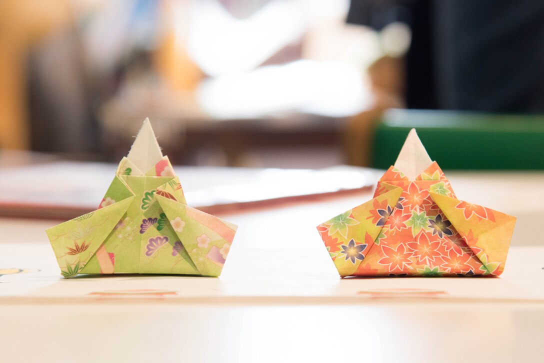 Origami Hina dolls sit on the desk during Japanese story time at Yokota Air Base, Japan, Feb. 25, 2019.
