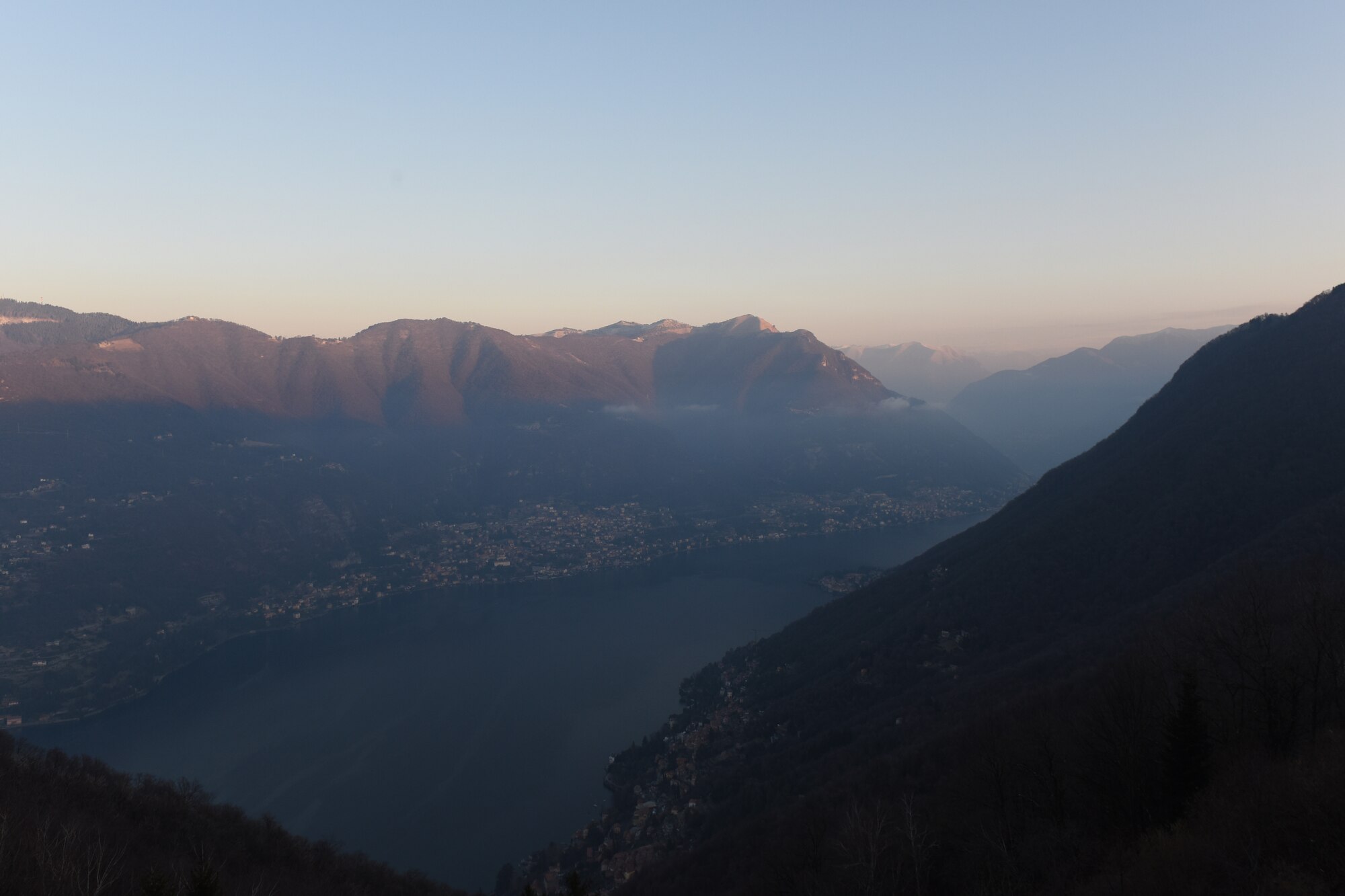 The sun begins to rise over Lake Como, Italy, Jan. 20, 2019. Lake Como is in Northern Italy’s Lombardy region, set against the foothills of the Alps. (U.S. Air Force photo by Airman 1st Class Madeline Herzog)