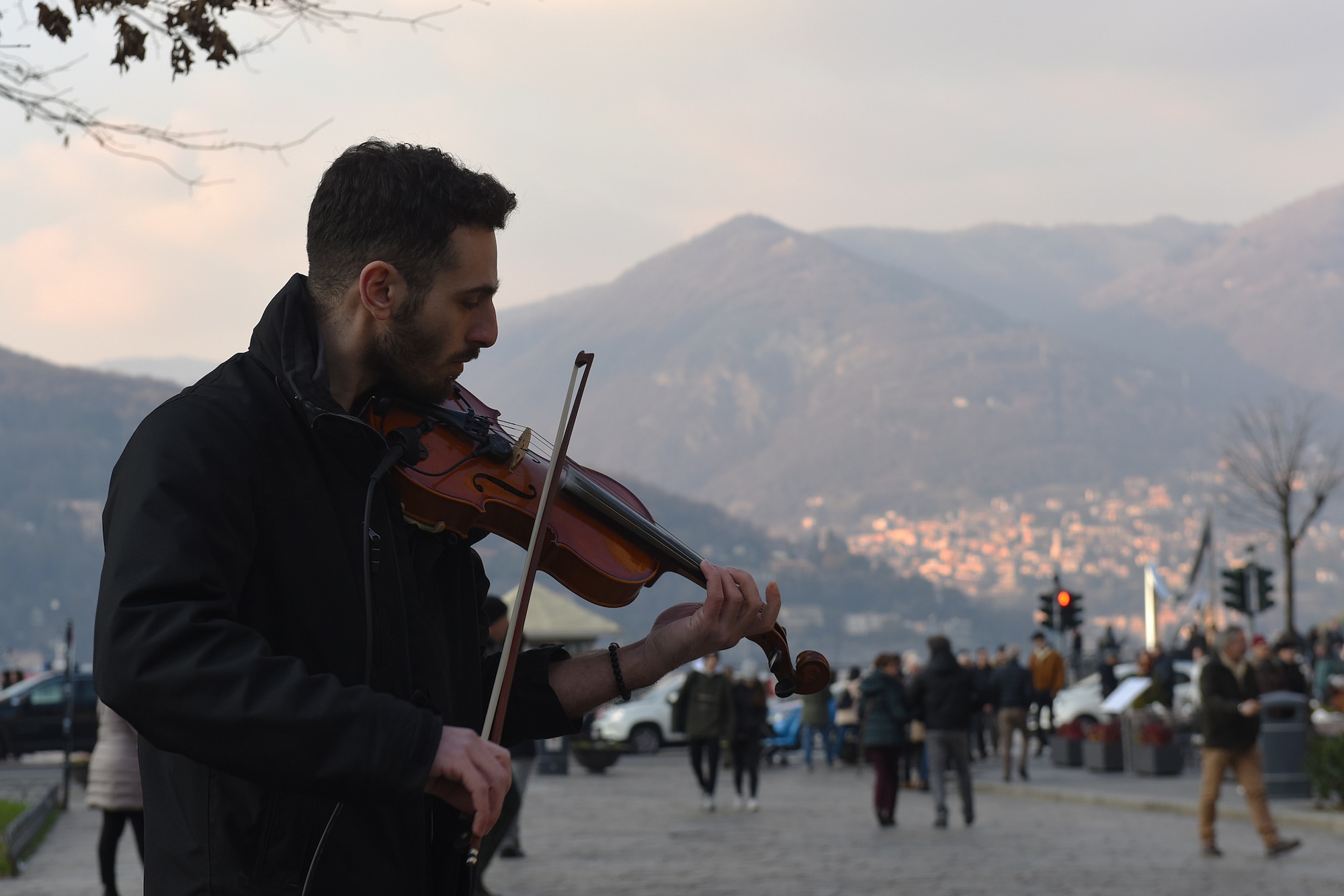 A musician plays the violin in Como, Italy, Jan. 20, 2019. Como is home to Renaissance architecture and a funicular that travels up to the mountain town of Brunate. (U.S. Air Force photo by Airman 1st Class Madeline Herzog)