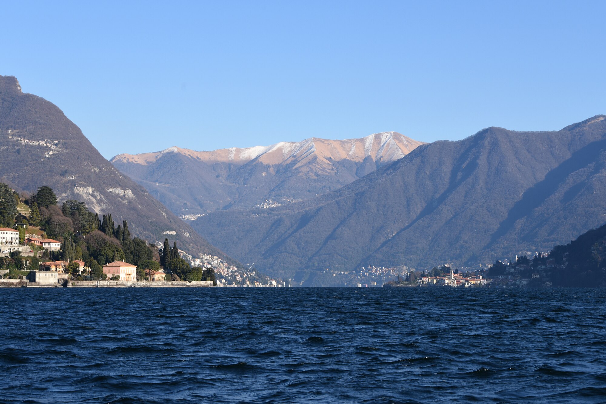 Several villas can be seen from Lake Como, Italy, Jan. 21, 2019. The lake is surrounded by scenic vistas, and visitors can participate in sailing, windsurfing and other water sports. (U.S. Air Force photo by Airman 1st Class Madeline Herzog)