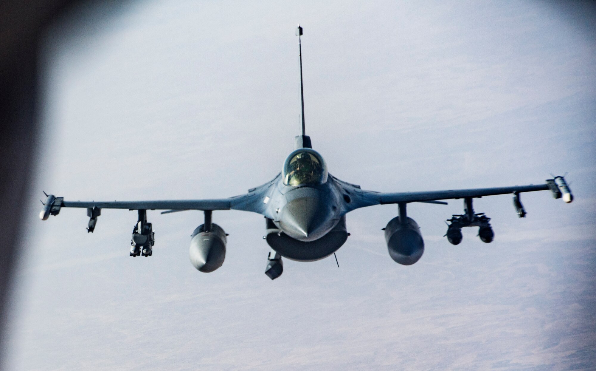 A U.S. Air Force KC-135 Stratotanker assigned to the 340th Expeditionary Air Refueling Squadron prepares to refuel an F-16 Fighting Falcon over Afghanistan, Jan. 21, 2019. The 340 EARS maintain a 24/7 presence in the U.S. Central Command area of responsibility, supporting U.S. and coalition aircraft in various operations in countries such as Iraq, Syria and Afghanistan. (U.S. Air Force Photo by Staff Sgt. Clayton Cupit)