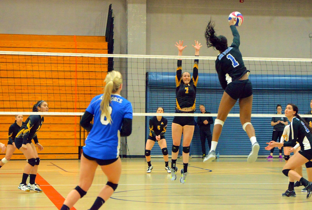 Elite U.S. military volleyball players from around the world compete for dominance at Fort Bragg's Ritz Epps Physical Fitness Center March 6-8, 2019 to determine the best of the best at the 2019 Armed Forces Volleyball Championship. Army, Navy (with Coast Guard) and Air Force teams squared off at the annual AFVC through three days of round-robin competition, to eventually crown the best men and women volleyball players in the military. U.S. Navy photo by Mass Communications Specialist 1st Class John Benson (Released)