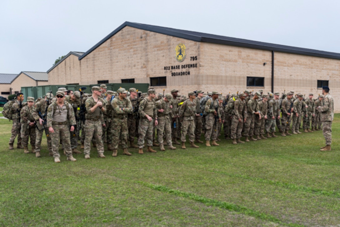 Maj. Michael Wetlesen, far right, 822d Base Defense Squadron commander, prepares Airmen for Scorpion Stakes, Feb. 20, 2019, at Moody Air Force Base, Ga. The two-day competition includes 18 stations such as a ruck, litter carry, simulated hostage rescue and vehicle search. The event has 18 four-Airman teams who are competing for 1st, 2nd and 3rd place by getting the highest score at the 18 different stations. Scorpion Stakes challenges Airmen on their career training and knowledge while having to physically and mentally overcoming obstacles. (U.S. Air Force photo by Airman 1st Class Taryn Butler)
