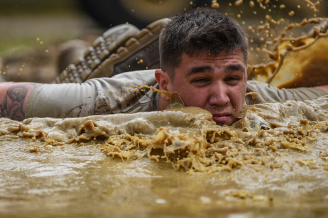 Airman Hunter Murphy, 822d Base Defense Squadron fireteam member, does pushups during Scorpion Stakes, Feb. 20, 2019, at Moody Air Force Base, Ga. The competition includes 18 stations such as a ruck, litter carry, simulated hostage rescue, vehicle search. Scorpion Stakes takes all the day-to-day fundamental skills and job knowledge and challenges Airmen on their career training and knowledge while having to physically and mentally overcoming obstacles. (U.S. Air Force photo by Airman 1st Class Taryn Butler)