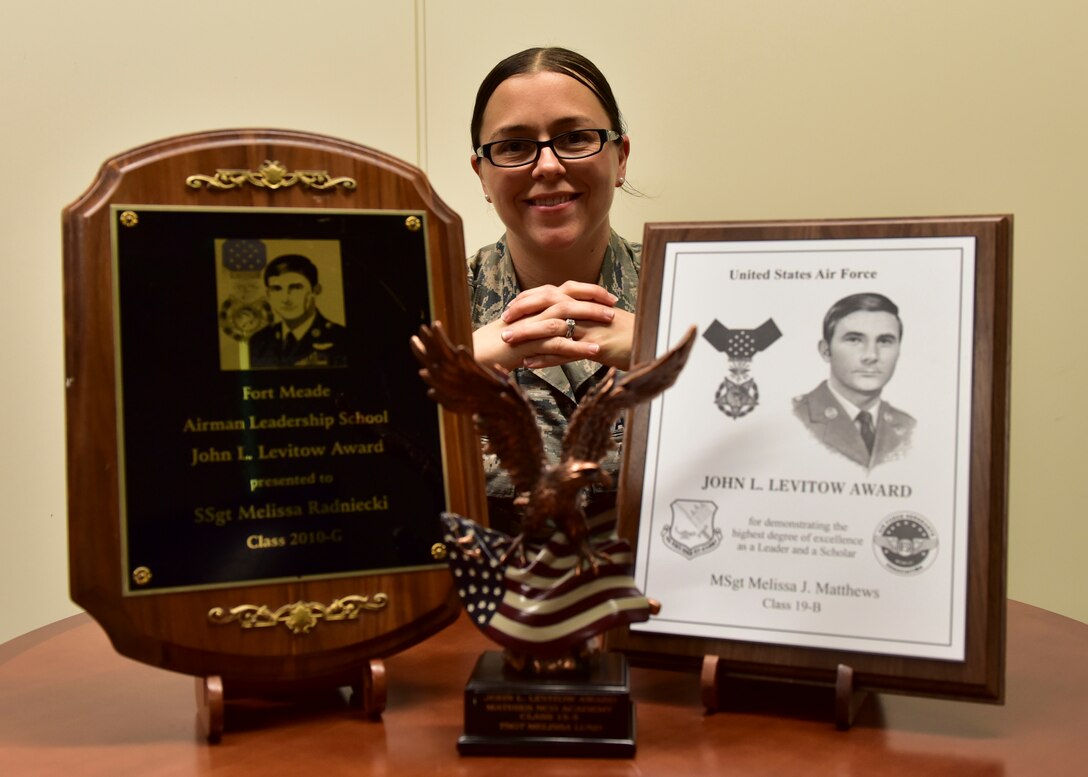U.S. Air Force Senior Master Sgt. Melissa Matthews, 324th Intelligence Squadron operations superintendent, showcases her three John L. Levitow Awards at Joint Base Pearl Harbor-Hickam, Hawaii, Feb. 26, 2019. Matthews earned her Levitow awards, the highest award for Enlisted Professional Military Education in the Air Force, for being the student who demonstrated the most outstanding leadership and scholastic achievement during her time in Airman Leadership School, Non-Commissioned Officer Academy and Senior Non-Commissioned Officer Academy. (U.S. Air Force photo by Staff Sgt. Eboni Prince)