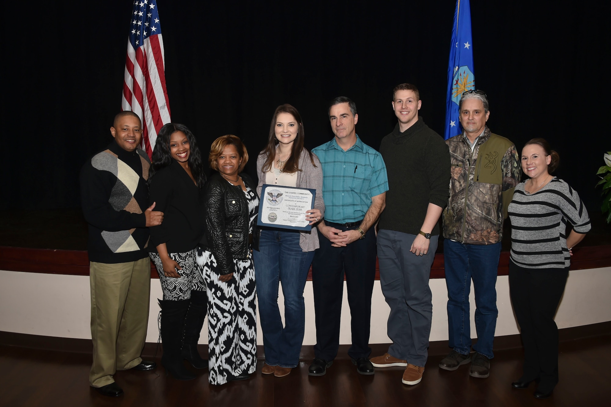 The Contemporary Praise Team from the 97th Air Mobility Wing chapel was awarded the Silver-Level Presidential Volunteer Service Award, March 2, 2019, at Altus Air Force Base, Okla. (U.S. Air Force photo by Senior Airman Cody Dowell)
