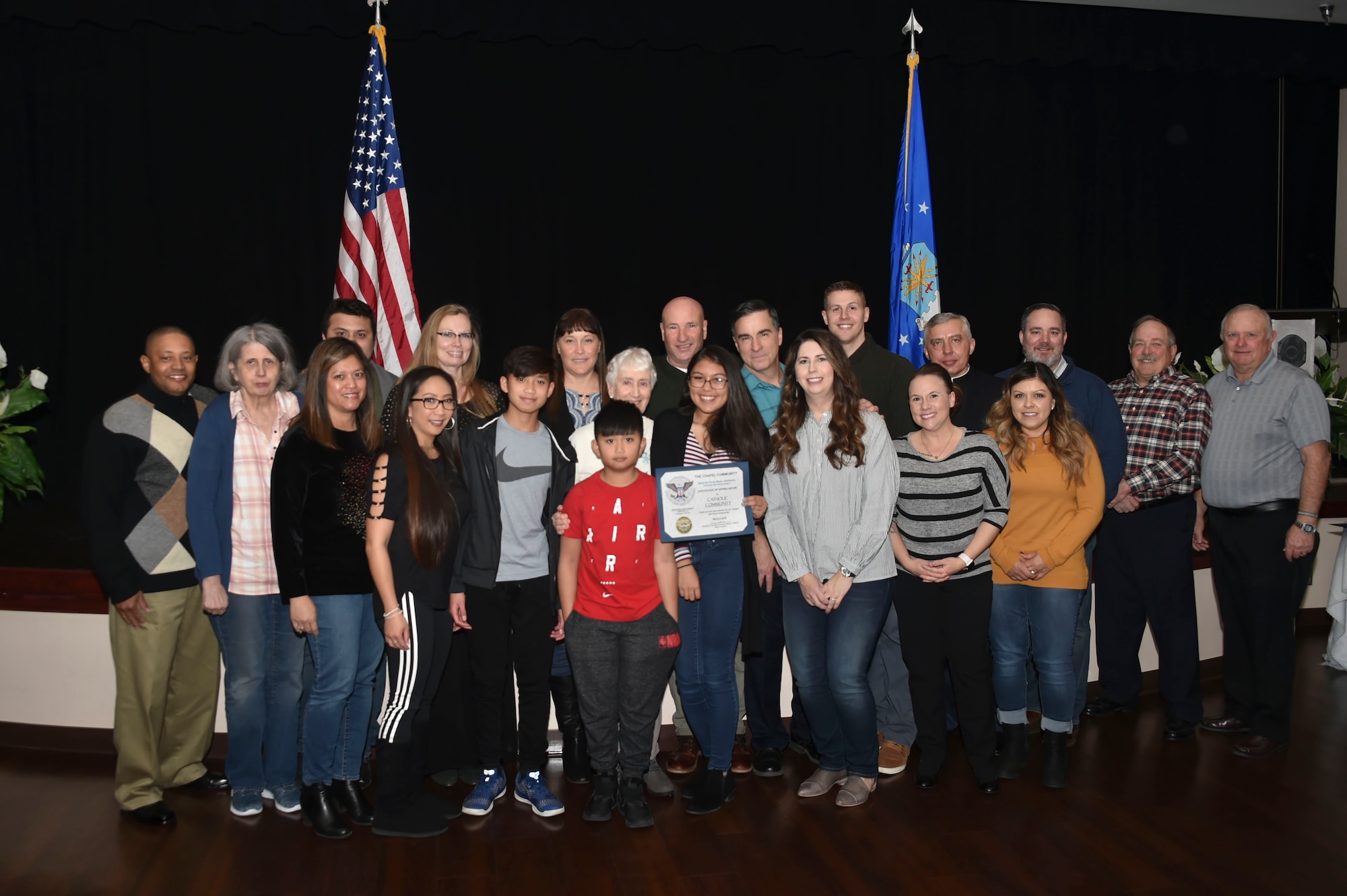 The Catholic Community from the 97th Air Mobility Wing chapel was awarded the Gold-Level Presidential Volunteer Service Award, March 2, 2019, at Altus Air Force Base, Okla. (U.S. Air Force photo by Senior Airman Cody Dowell)
