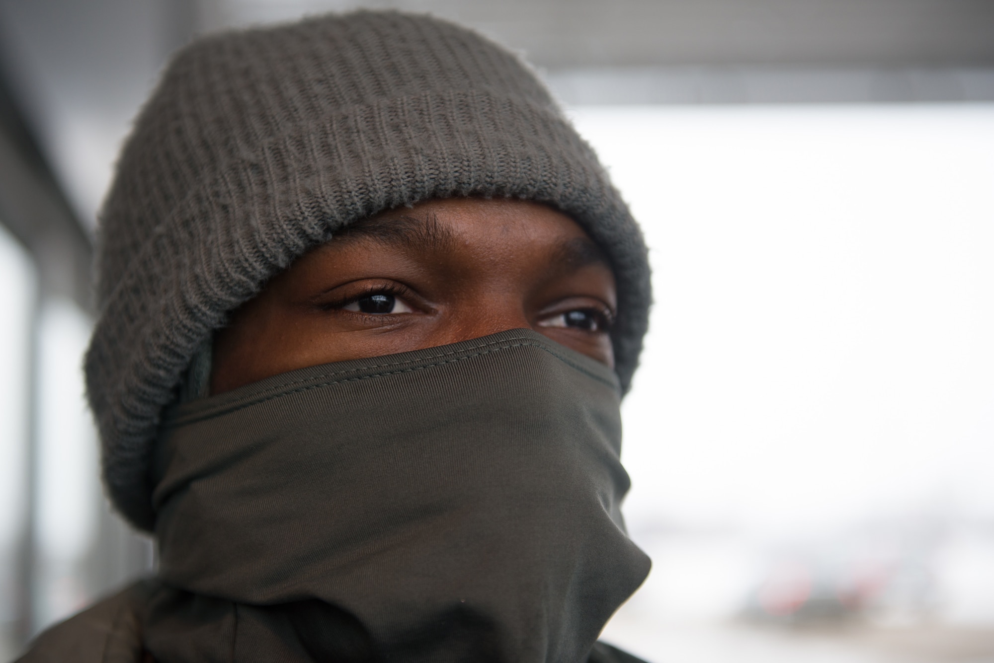 Airman 1st Class Jesse Cooper, 55th Security Force Squadron, stands guard at the U.S. Strategic Command gate March 7, 2019, on Offutt Air Force Base. He is one of nearly a dozen guards working the gate in subfreezing temperatures. (U.S. Air Force photo by Tech. Sgt. Rachelle Blake)